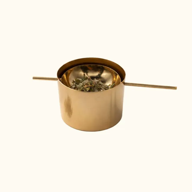 Mas du Roseau Pachamama brûleur à herbes métal doré